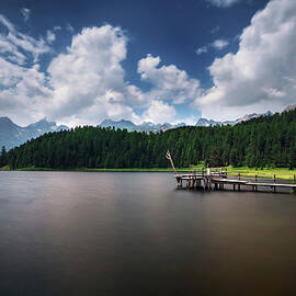 Footbridge over the Lake of Staz near St. Moritz in Switzerland by Miroslav Liska