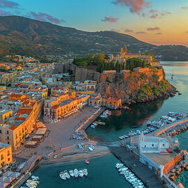 Italy, Sicily, Messina District, Aeolian Islands, Lipari, Square And The Small Port Of Marina Corta At Dawn With The Fortress Of The Lipari Castle In The Background by Giorgio Filippini