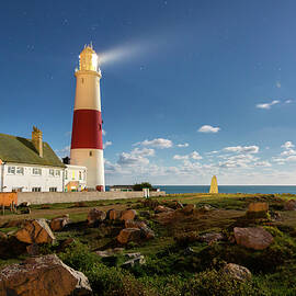 Lighthouse At Night by Sebastian Wasek