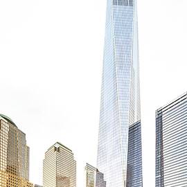 New York City, Manhattan, Lower Manhattan, One World Trade Center, Freedom Tower, National September 11 Memorial With Freedom Tower During The Foliage by Antonino Bartuccio
