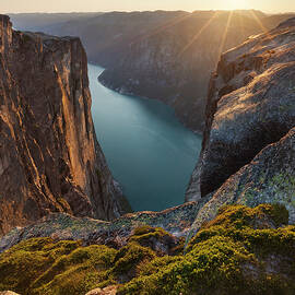 Overlooking The Lysefjord From Kjerag Plateau Of Rocks In The Setting Sun, Rogaland, Norway, Scandinavia by Tobias Richter