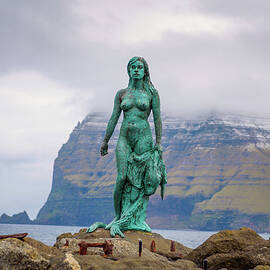 Statue of Selkie or Seal Wife in Mikladalur, Faroe Islands by Miroslav Liska