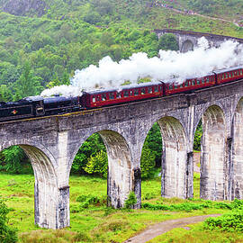 Uk, Scotland, Highland, Glenfinnan, Great Britain, Highlands, British Isles, Jacobite Steam Train On The Glenfinnan Viaduct Which Inspired The Harry Potter Hogwarts Express by Luigi Vaccarella