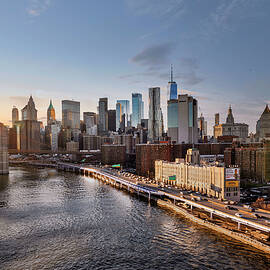 New York City, East River Scene With Lower East Side Skyline Viewed From Manhattan Bridge by Lumiere