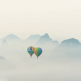 Hot Air Balloon Ride At Dawn Over Karst by Alex Linghorn