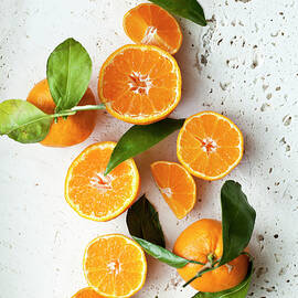 Oranges With Leaves, Whole, Halved And Slices by Ryla Campbell