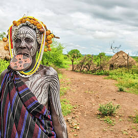 Woman from the african tribe Mursi, Omo Valley, Ethiopia by Miroslav Liska