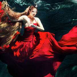 Female Dancer Performing Under Water by Henrik Sorensen