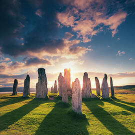 United Kingdom, Scotland, Great Britain, British Isles, Lewis And Harris, Iconic Callanish Stone Circle In The Outer Hebrides At Sunset by Maurizio Rellini
