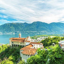 Switzerland, Ticino, Tessin, Lake Maggiore, Alps, Locarno, Madonna Del Sasso Church With View On The Town Of Locarno And Lake Maggiore by Marco Arduino