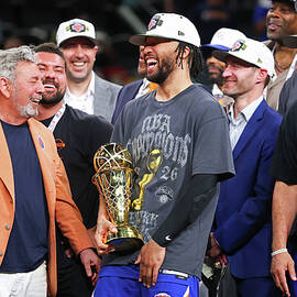 Jalen Brunson Holds the Trophy by Gregory Shamus