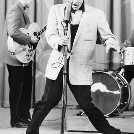Elvis Presley Performing by Bettmann