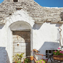 Italy, Apulia, Bari District, Itria Valley, Alberobello, Famous For Its Unique Trullo Buildings by Richard Taylor