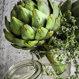 A Flower Arrangement Of Artichokes by Donna Crous