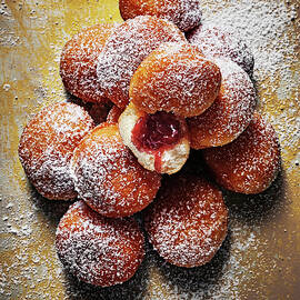 A Stack Of Mini Jam Doughnuts With Icing Sugar by Manfred Rave