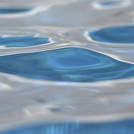 Abstract Detail Water Ripple In Pool by Getty Images