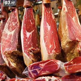 Air-dried Ham Hanging In The Market In Barcelona, Spain by Paul Poplis