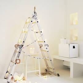 Alternative Christmas Tree Made From Folding Ladder And Take-away Cartons Used As Candle Lanterns by James Stokes