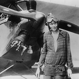 Ameila Earhart With Airplane by Getty Images