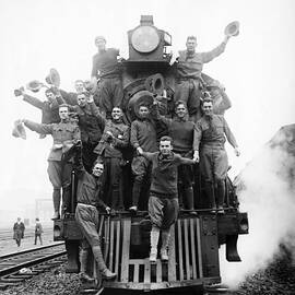 American Soldiers Riding On The Front by Bettmann