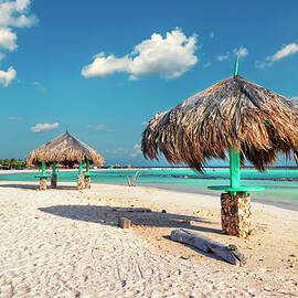 Aruba, Baby Beach With Straw Huts by Claudia Uripos