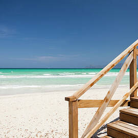 Beach At  Alcudia Bay by Jorg Greuel