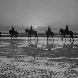 Beach Riders by Fox Photos