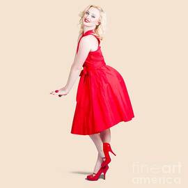 Beautiful woman model in red dress and high heels by Jorgo Photography