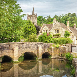 Bridge Across Bybrook River In Castle Combe, Wiltshire, England, Great Britain by Christian Muringer