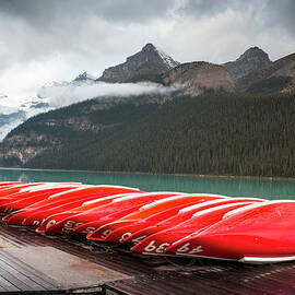 Canoes On The Dock by Pgiam