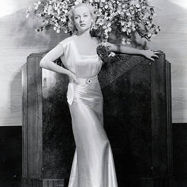 Carole Lombard In Gold Dress Fulllength by Bettmann
