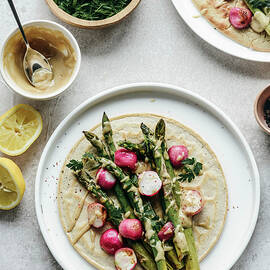 Chickpea Pancakes With Asparagus Roasted Radish Topped With Tahini Sauce by Kasia Wala