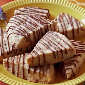 Chocolate Drizzled Blondies Cut Into Triangles by Jon Edwards Photography