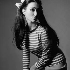 Christine Curtis with Pigtails by Bert Stern