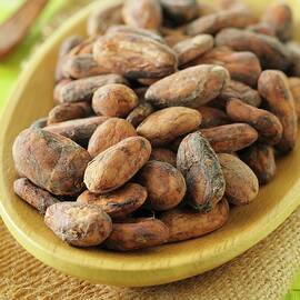 Cocoa Beans In A Wooden Dish by Jean-christophe Riou