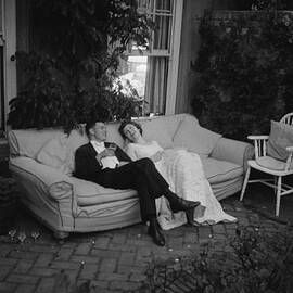 Couple At Party by Thurston Hopkins