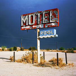 Derelict Motel Sign In The Desert by Gary Yeowell