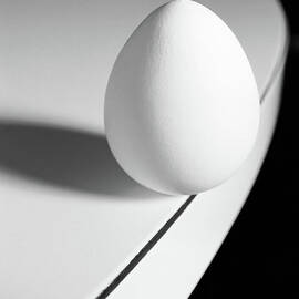 Egg Carefully Balancing At The Edge Of by Scotspencer