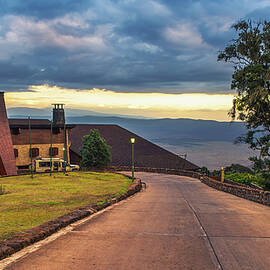 Entrance to the luxury Ngorongoro Wildlife Lodge viewed at sunset by Miroslav Liska