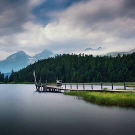 Footbridge over the Lake of Staz near St. Moritz in Switzerland by Miroslav Liska