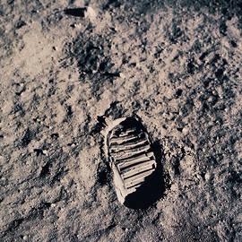 Footprint On Lunar Surface by Stockbyte