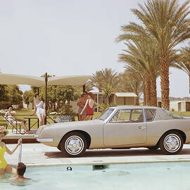 Friends Having Fun Near Pool by Tom Kelley Archive
