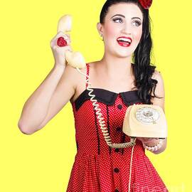 Funny pin-up woman talking on retro phone by Jorgo Photography