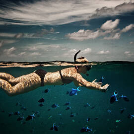 Girl Snorkelling In Indian Ocean by Rjw
