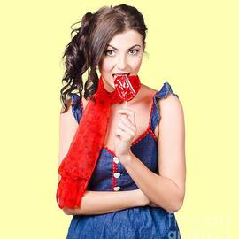 Glamorous girl eating lollipop. Eat your heart out by Jorgo Photography