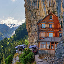 Guest house Aescher-Wildkirchli under a cliff on mountain Ebenalp in Switzerland by Miroslav Liska