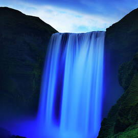 Iceland, South Iceland, Skogafoss Waterfall At Night by Maurizio Rellini
