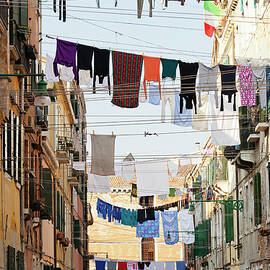 Italy, Veneto, Venezia District, Venetian Lagoon, Adriatic Coast, Venice, Clothes Hanging To Dry In The Backstreets Of Venice by Kav Dadfar