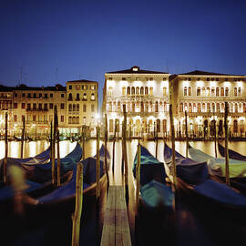 Italy, Veneto, Venice, Row Of Gondolas by Gary Yeowell