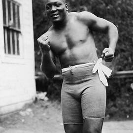Jack Johnson In Boxing Stance by Fpg